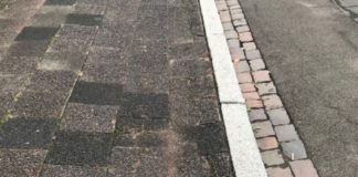 Austausch schadhafter Gehwegplatten in der Pariser Straße