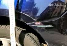 Gesucht: Rotes Fahrzeug mit grüner Aufschrift!