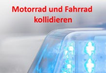 Motorrad und Fahrrad kollidieren